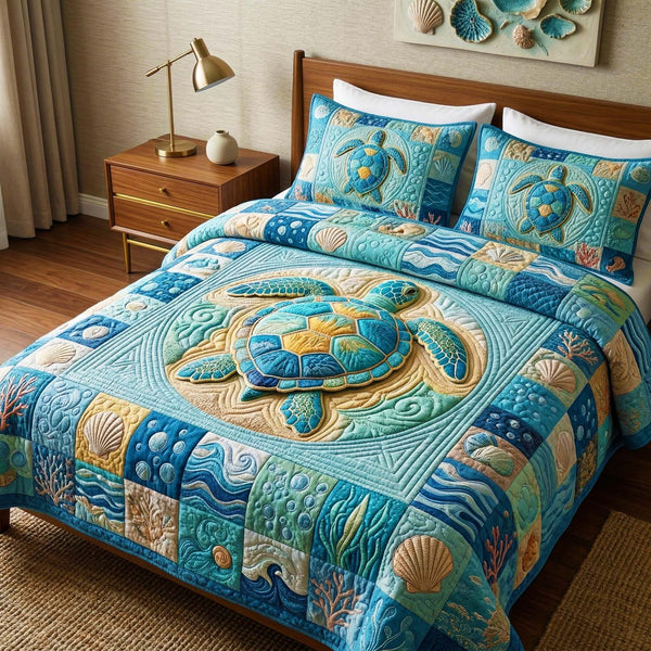 Indigo Sea quilted 3-piece bedding set on a made bed in a light coastal bedroom