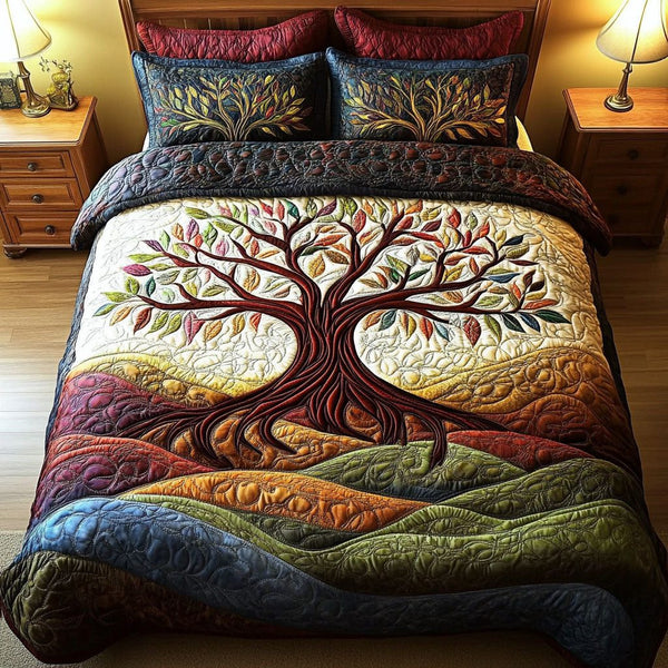Infinite Growth quilted 3-piece bedding set on a made bed with two matching pillow shams