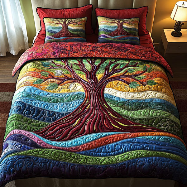 Infinite Tree quilted 3-piece bedding set on a made bed with two matching pillow shams