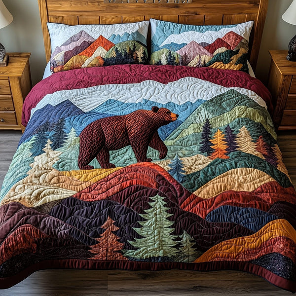 Into the Wild quilted 3-piece bedding set on a made bed with two matching pillow shams