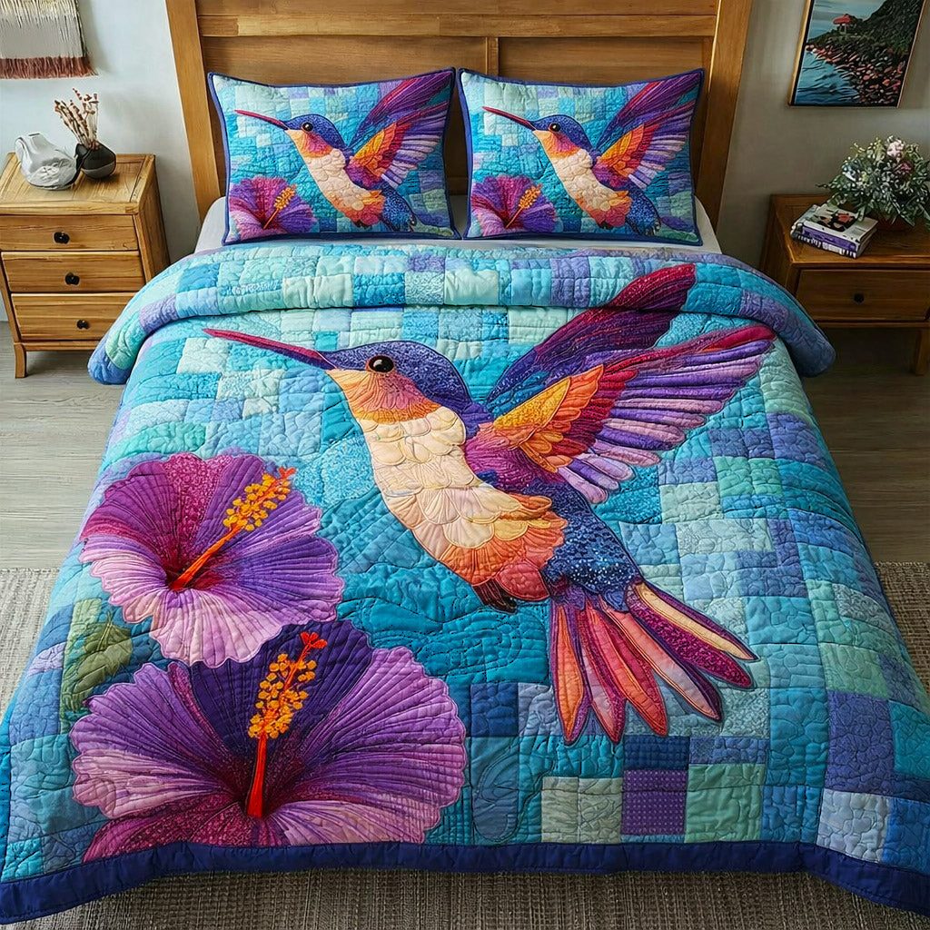 Iridescent Flutter quilted 3-piece bedding set on a made bed with two matching pillow shams