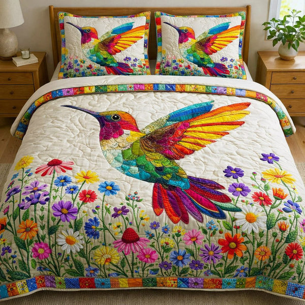 Iridescent Flutter quilted 3-piece bedding set on a made bed with two matching pillow shams