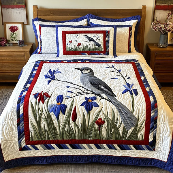 Iridescent Garden quilted 3-piece bedding set on a made bed with two matching pillow shams