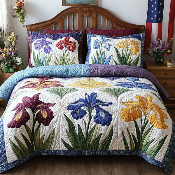 Iris Bloom quilted 3-piece bedding set on a made bed with two matching pillow shams