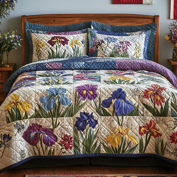 Iris Delight quilted 3-piece bedding set on a made bed with two matching pillow shams