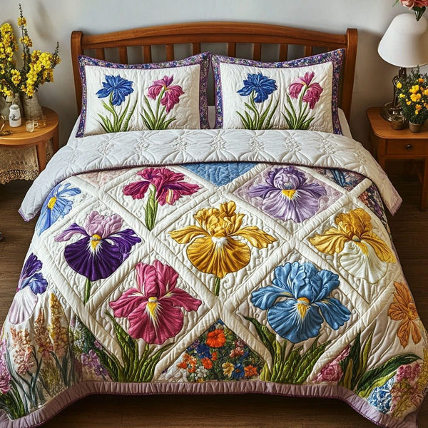 Iris Reverie quilted 3-piece bedding set on a made bed with two matching pillow shams