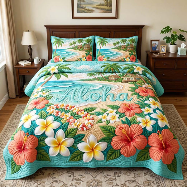 Island Aloha quilted 3-piece bedding set on a made bed in a light coastal bedroom