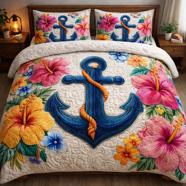 Island Bloom Anchor quilted 3-piece bedding set on a made bed in a light coastal bedroom