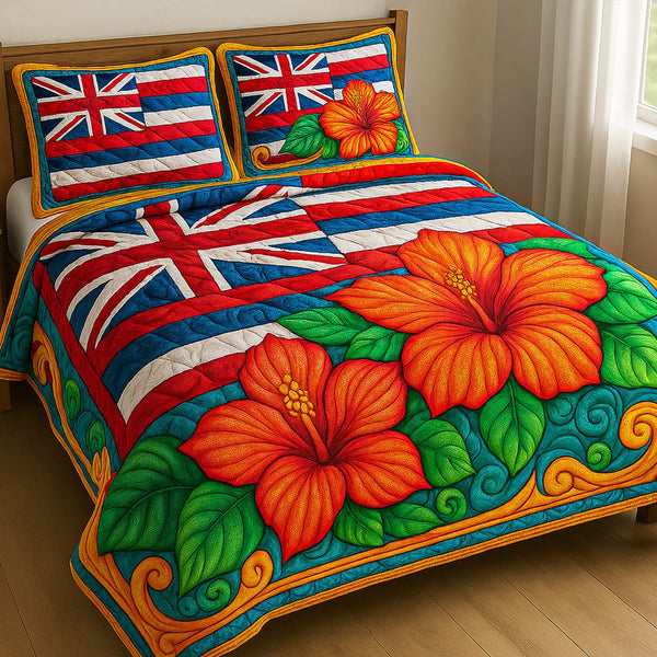 Island Bloom quilted 3-piece bedding set on a made bed in a light coastal bedroom