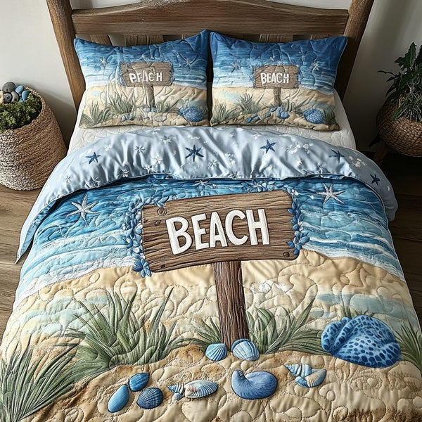 Island Breeze quilted 3-piece bedding set on a made bed in a light coastal bedroom