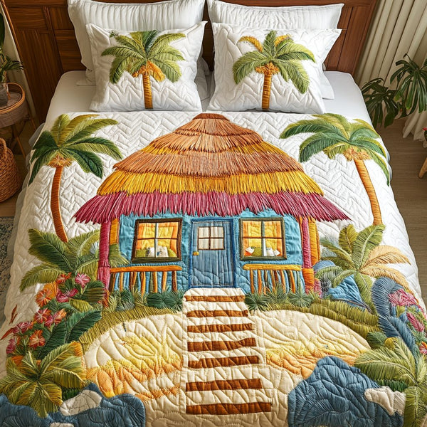 Island Dreams quilted 3-piece bedding set on a made bed in a light coastal bedroom