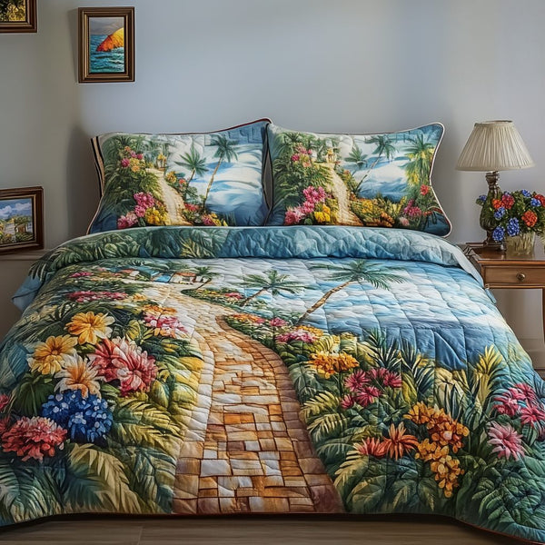 Island Escape quilted 3-piece bedding set on a made bed in a light coastal bedroom