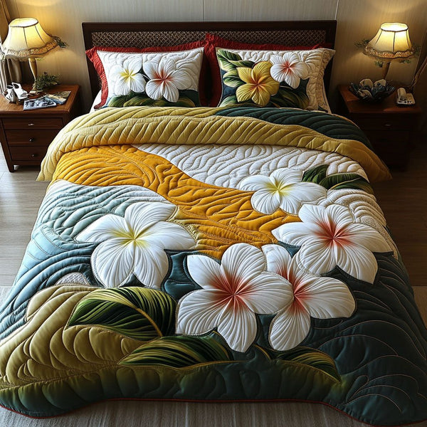 Island Fragrance quilted 3-piece bedding set on a made bed in a light coastal bedroom