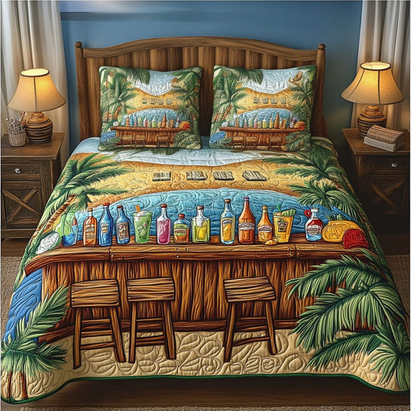 Island Life quilted 3-piece bedding set on a made bed in a light coastal bedroom