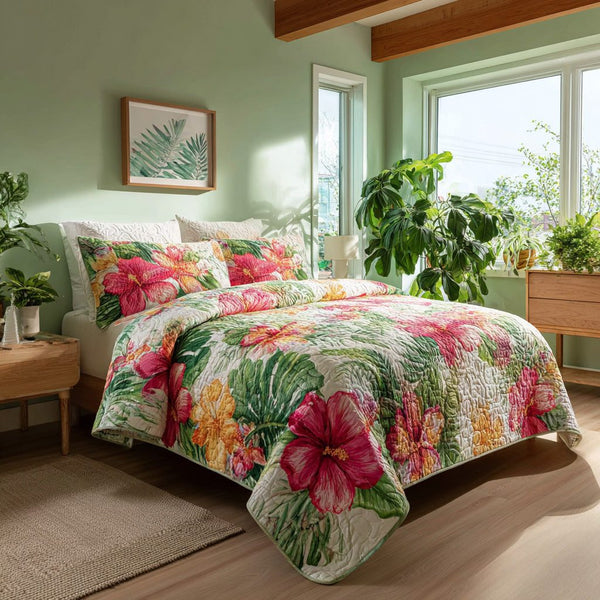 Island Oasis quilted 3-piece bedding set on a made bed in a light coastal bedroom