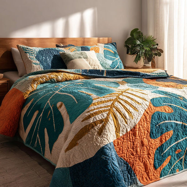 Island Retreat quilted 3-piece bedding set on a made bed in a light coastal bedroom