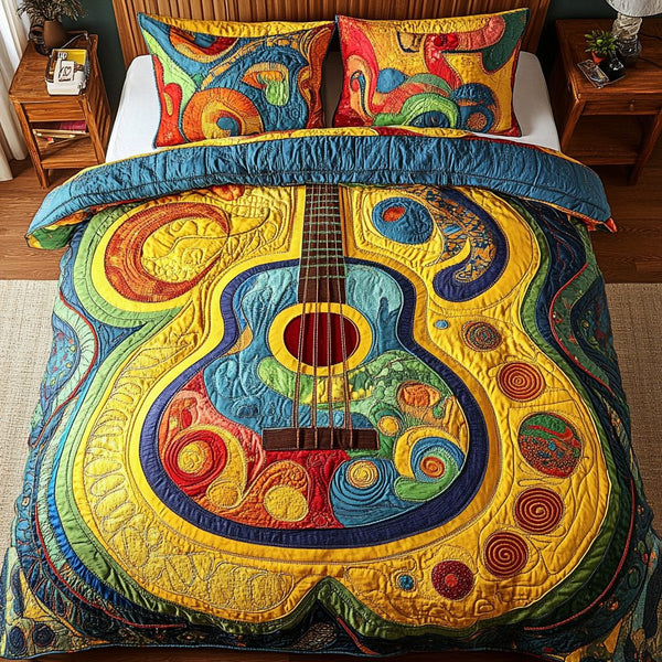 Island Rhythms quilted 3-piece bedding set on a made bed in a light coastal bedroom