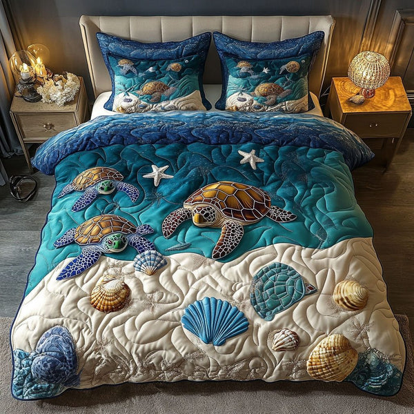 Island Shellscape quilted 3-piece bedding set on a made bed in a light coastal bedroom