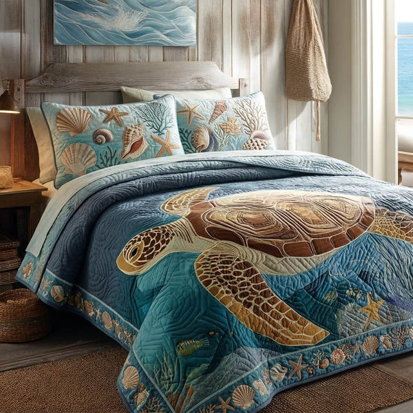 Island Turtle quilted 3-piece bedding set on a made bed in a light coastal bedroom