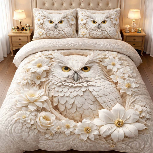 Ivory Blossom Owl quilted 3-piece bedding set on a made bed with two matching pillow shams