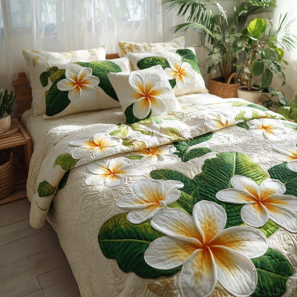 Ivory Island quilted 3-piece bedding set on a made bed in a light coastal bedroom