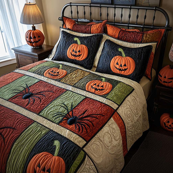 Jack Lanterns quilted 3-piece bedding set on a made bed with two matching pillow shams