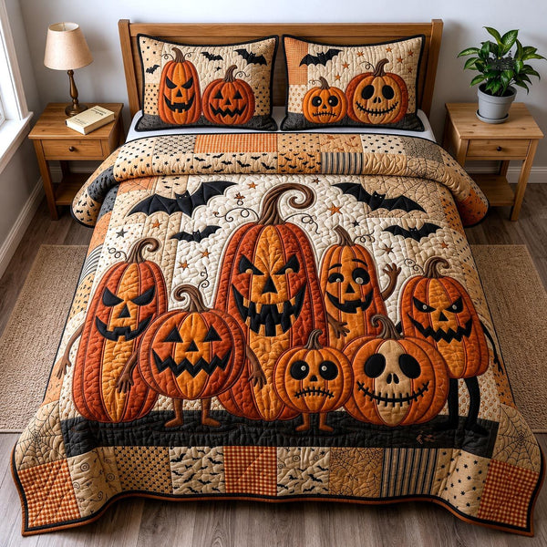 Jack O Lantern quilted 3-piece bedding set on a made bed with two matching pillow shams