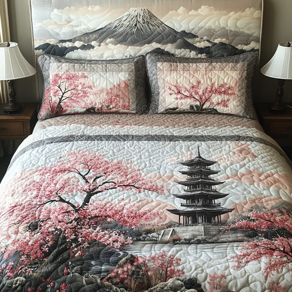 Japan Cherry Blossom Pagoda quilted 3-piece bedding set on a made bed with two matching pillow shams