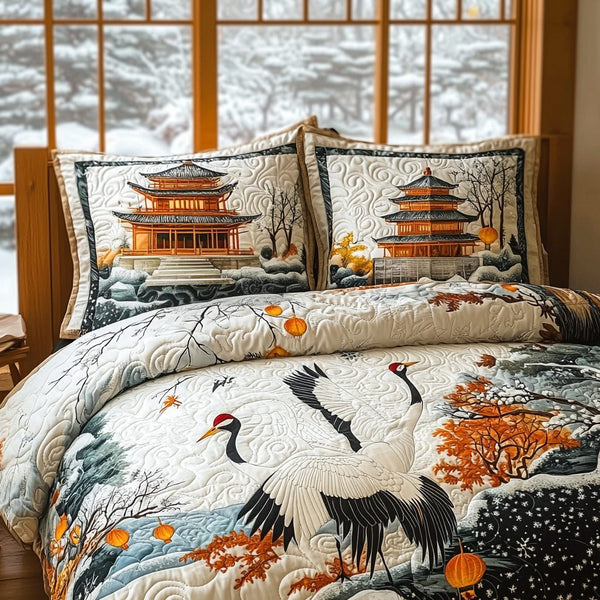 Japanese Crane Artistic Charm quilted 3-piece bedding set on a made bed with two matching pillow shams