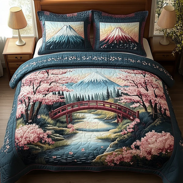 Japanese Garden Bridge quilted 3-piece bedding set on a made bed with two matching pillow shams