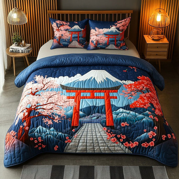 Japanese Gateway quilted 3-piece bedding set on a made bed with two matching pillow shams