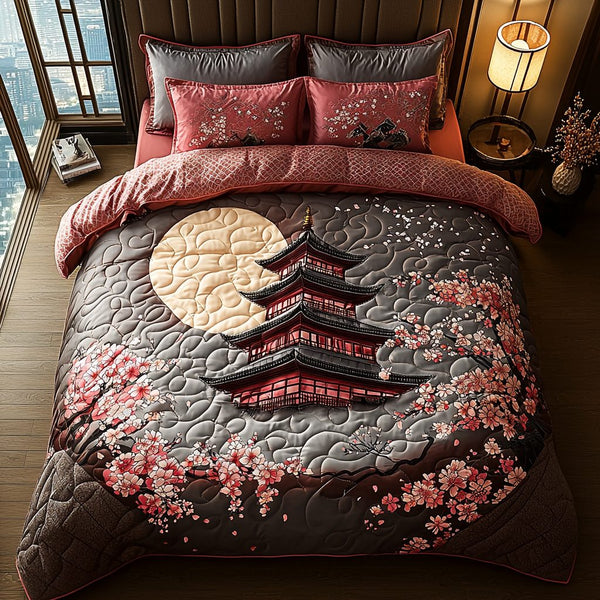 Japanese Pagoda Ancient Moon quilted 3-piece bedding set on a made bed with two matching pillow shams
