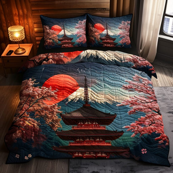 Japanese Pagoda Sunset quilted 3-piece bedding set on a made bed with two matching pillow shams