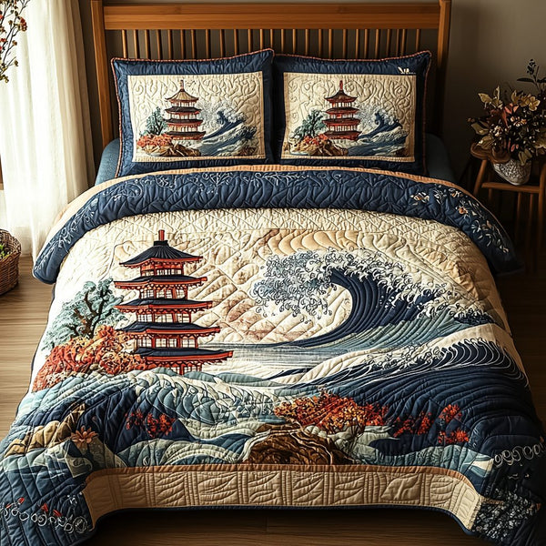 Japanese Pagoda Wave quilted 3-piece bedding set on a made bed in a light coastal bedroom