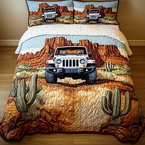 Jeep in the Canyon quilted 3-piece bedding set on a made bed with two matching pillow shams