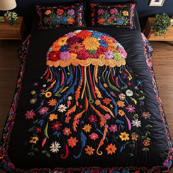 Jellyfish Dance quilted 3-piece bedding set on a made bed with two matching pillow shams