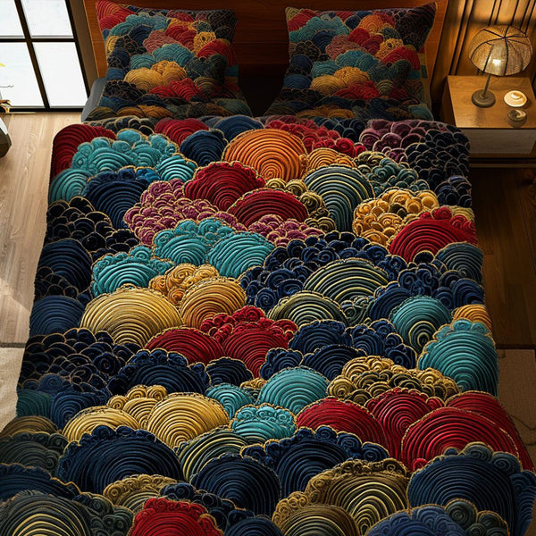 Jewel Garden quilted 3-piece bedding set on a made bed with two matching pillow shams