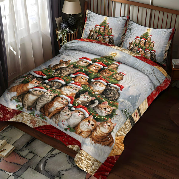 Jolly Catmas quilted 3-piece bedding set on a made bed with two matching pillow shams