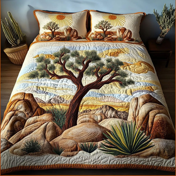 Joshuas Valley quilted 3-piece bedding set on a made bed with two matching pillow shams
