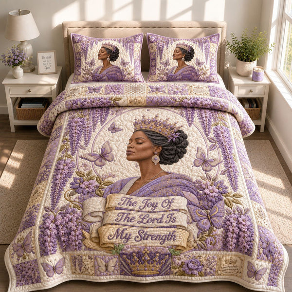 Joy Of the Lord Wisteria quilted 3-piece bedding set on a made bed in a softly lit bedroom