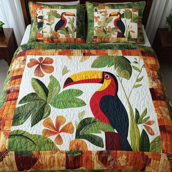 Joyful Toucans quilted 3-piece bedding set on a made bed with two matching pillow shams