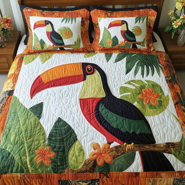 Joyful Toucans quilted 3-piece bedding set on a made bed with two matching pillow shams