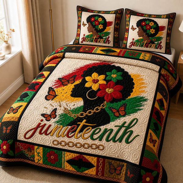 Juneteenth Bloom quilted 3-piece bedding set on a made bed in a warmly lit bedroom
