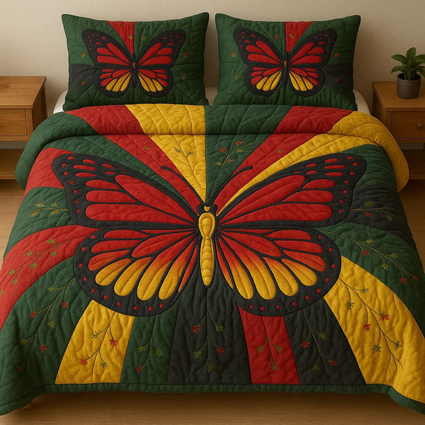 Juneteenth Butterfly quilted 3-piece bedding set on a made bed in a warmly lit bedroom
