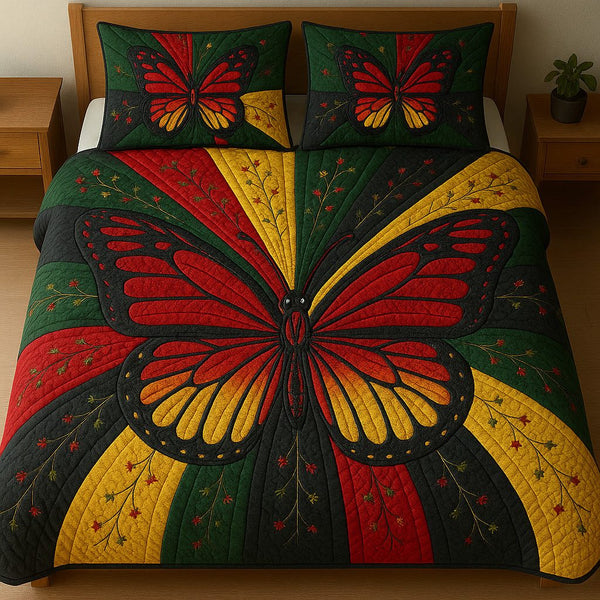 Juneteenth Butterfly quilted 3-piece bedding set on a made bed in a warmly lit bedroom