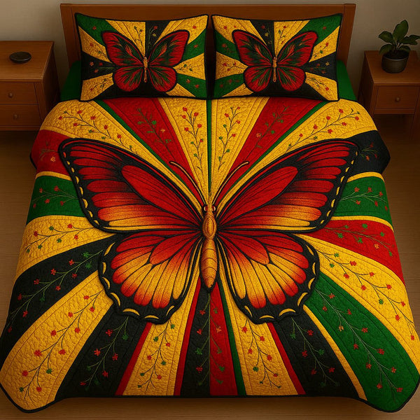 Juneteenth Butterfly quilted 3-piece bedding set on a made bed in a warmly lit bedroom