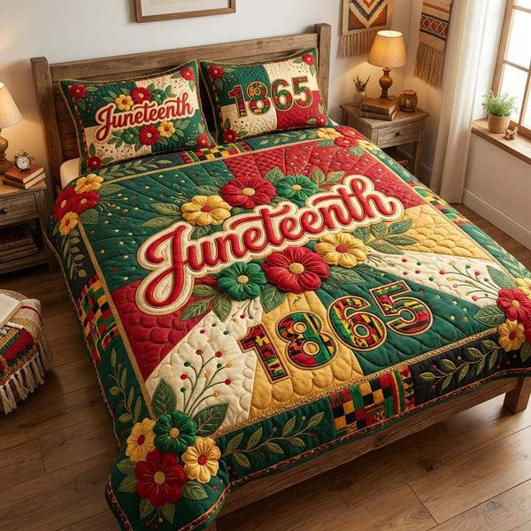Juneteenth Floral 1865 quilted 3-piece bedding set on a made bed in a warmly lit bedroom