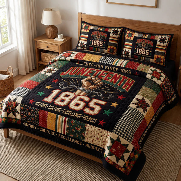 Juneteenth Freeish quilted 3-piece bedding set on a made bed in a warmly lit bedroom