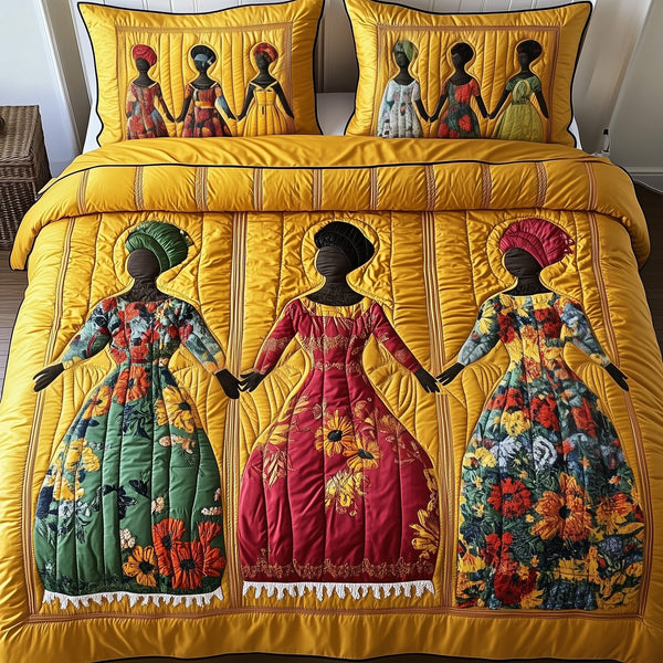 Juneteenth quilted 3-piece bedding set on a made bed in a warmly lit bedroom