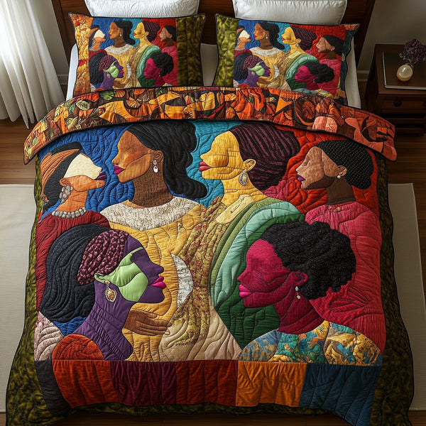 Juneteenth quilted 3-piece bedding set on a made bed in a warmly lit bedroom